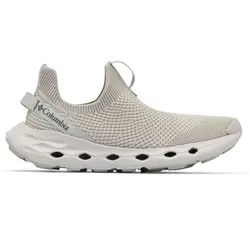 A Columbia slip-on shoe with a light gray knit upper and a cushioned sole featuring ventilation holes.