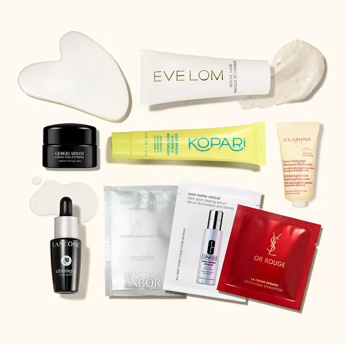 The Macy's 9pc Beauty Sampler includes products from Eve Lom, Kopari, Clarins, Giorgio Armani, Lancôme, Doctor Babor, Clinique, and Yves Saint Laurent, featuring a variety of skincare creams, serums, and masks.