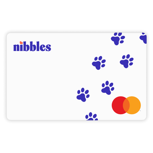 A white card with \“nibbles\“ in purple, adorned with blue paw prints, featuring the Mastercard logo in the corner.