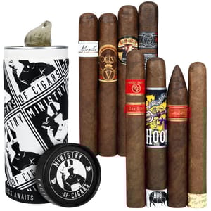 A selection of cigars is displayed alongside a cylindrical container labeled \“Ministry of Cigars,\“ featuring various cigar bands with different designs and colors.