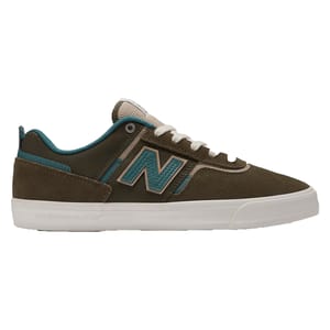 New Balance Numeric 306 shoes feature an olive green suede and mesh upper with teal accents, a reinforced toe, white laces, and a white rubber sole, designed for skateboarding durability and style.