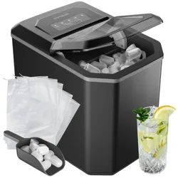 A compact countertop ice maker with a scoop, ice cubes, and ice storage bags, alongside a glass of ice-filled beverage garnished with mint and lemon.