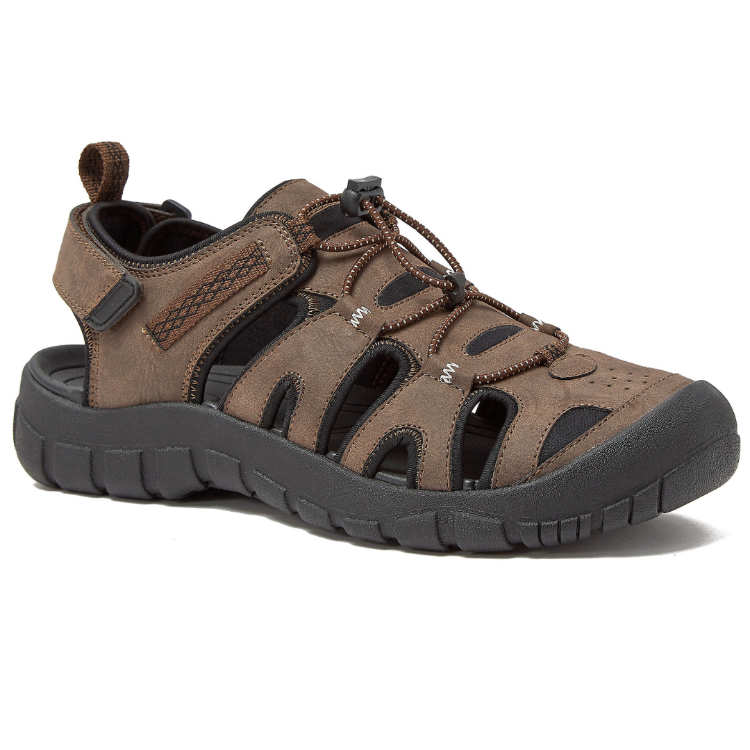 Brown outdoor sandal with a rugged, closed-toe design, adjustable strap, and elastic lacing system. Features a durable black sole for traction and stability.