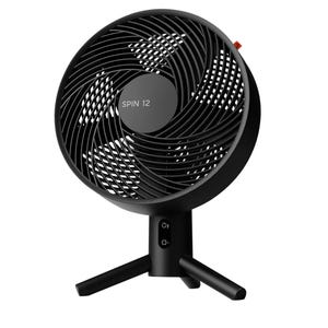 A black table fan labeled \“SPIN 12\“ with a modern, circular design and three-legged stand.