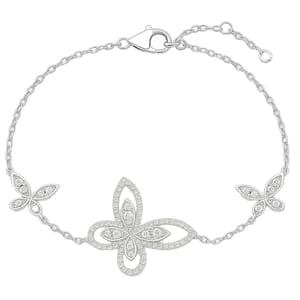 A delicate bracelet featuring butterfly-shaped elements encrusted with small stones, linked by a fine chain and secured with a lobster clasp.