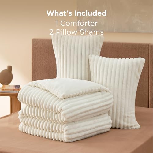 Cream-colored, textured bedding set including one comforter and two pillow shams.