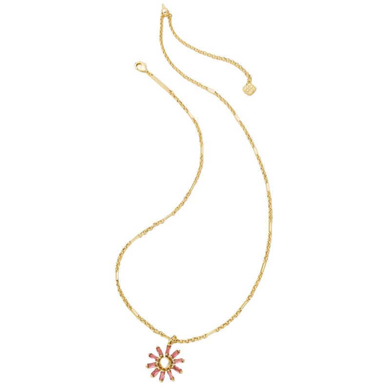 Gold chain necklace with a flower pendant featuring pink gemstone petals and a central gold dot.