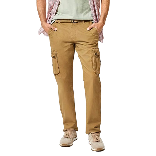 A person wearing tan cargo pants with multiple pockets, a light green shirt, and sneakers.