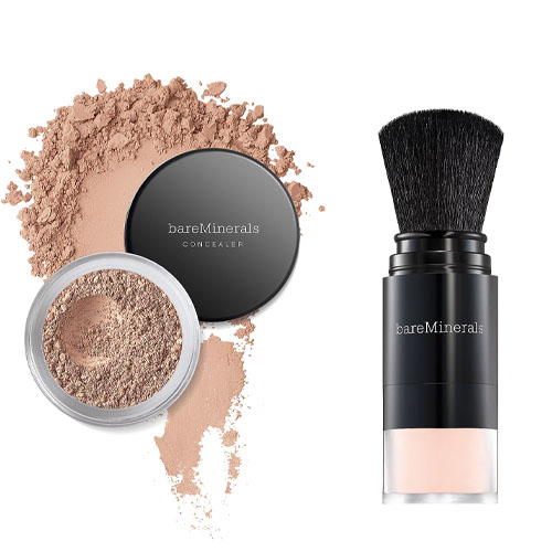 The bareMinerals Deluxe Concealer Set includes a loose powder concealer in a round jar with a black lid and a retractable brush. The concealer appears in a light, natural shade for coverage.