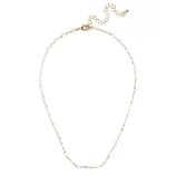 A delicate gold chain necklace with small opalescent beads interspersed along its length, featuring an adjustable chain clasp.