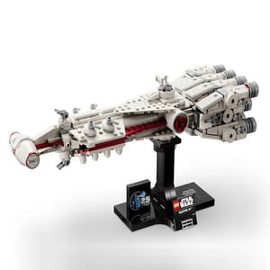 Lego Tantive IV Building Set features a detailed miniature replica of the iconic Star Wars starship, displayed on a stand celebrating the 25th anniversary of Lego Star Wars.