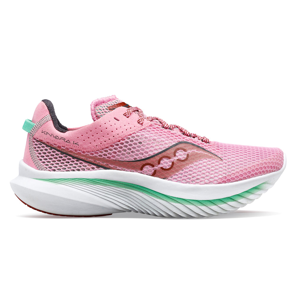 Pink running shoe with white outsole and green accents, labeled \“KINVARA 12.\“