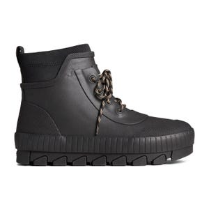 Black ankle-high laced boot with a chunky, treaded sole and textured detailing around the heel.