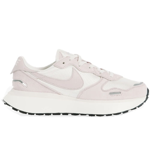 Nike Phoenix Waffle Sneakers feature a soft pink and white color scheme with a classic Swoosh logo, cushioned midsole, and a textured outsole for traction. They have a sleek, retro-inspired design combining suede and textile materials.