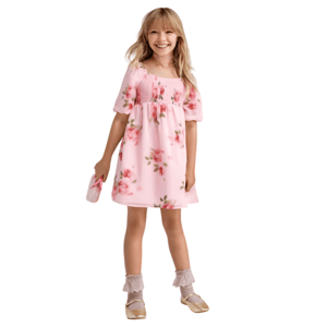 Girl wearing a pink floral dress with puff sleeves, paired with lace-trimmed socks and gold shoes. She holds a matching floral purse.