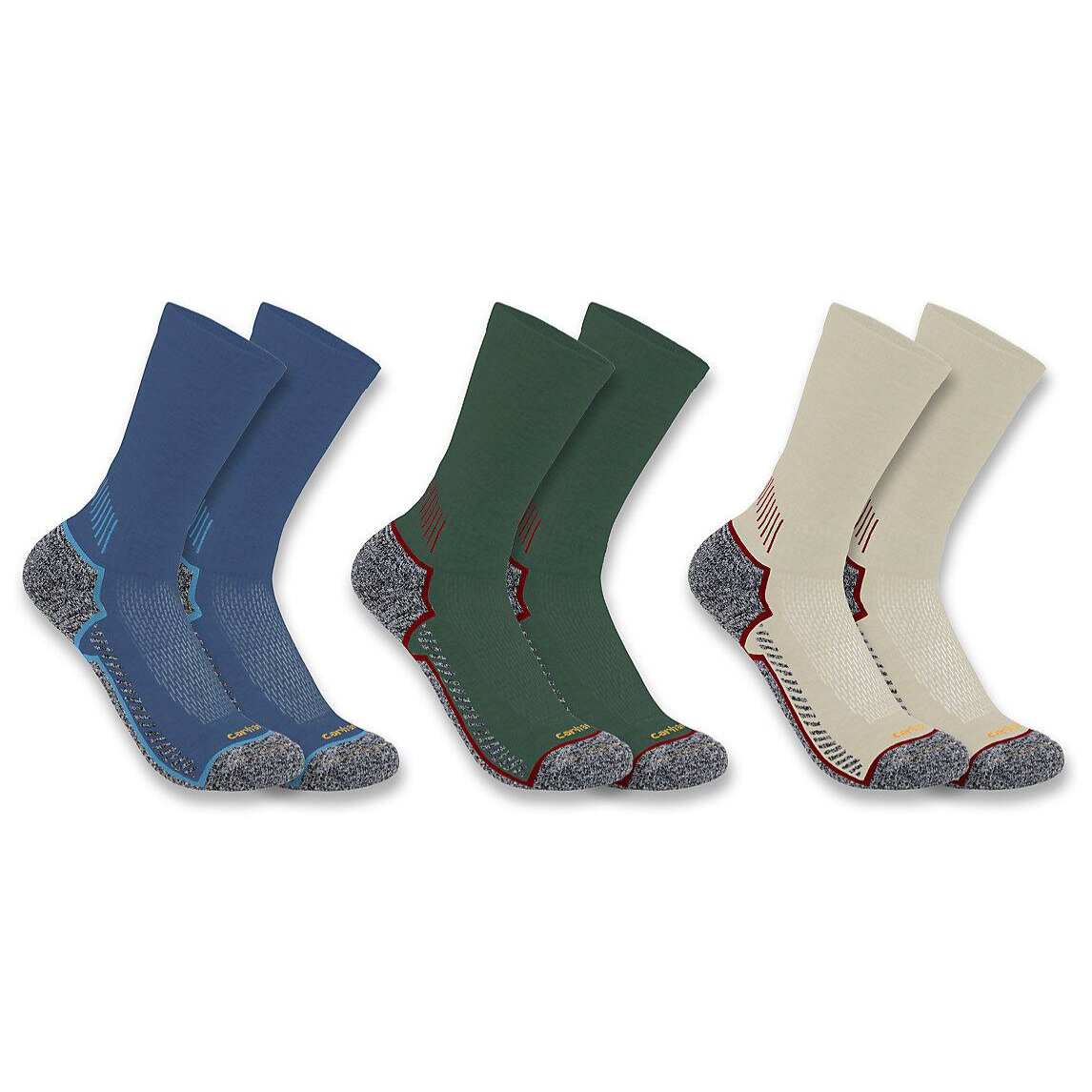 Three pairs of outdoor socks in blue, green, and beige with reinforced heels and toes, featuring contrasting colors and cushioning for added support and comfort.