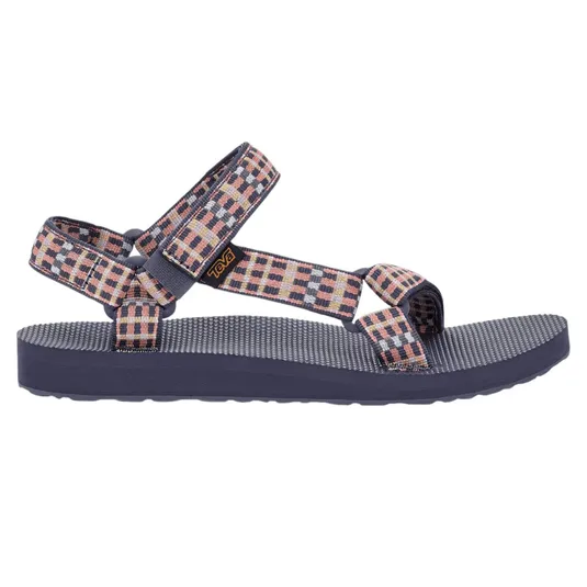 A sandal featuring a patterned textile strap with an adjustable hook-and-loop closure, a textured footbed, and a flat sole for casual comfort.