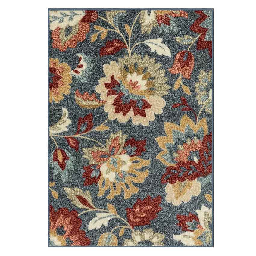 A floral patterned area rug with a blue background featuring multicolored flowers in red, yellow, and beige tones.