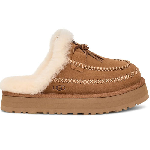 Brown shearling-lined slip-on mule with stitch detailing and a rugged sole.