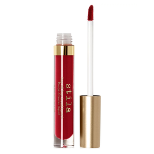 Stila Stay All Day Liquid Lipstick in red with a gold cap, featuring a doe-foot applicator wand.
