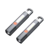 Two gray and orange LED flashlights with a cylindrical shape, featuring a front-facing light and a side panel of LED bulbs. Each has a carabiner clip for easy attachment.