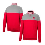 Red and gray quarter-zip pullover with striped collar and \“N\“ logo on the chest. Features side pockets and ribbed cuffs and hem.