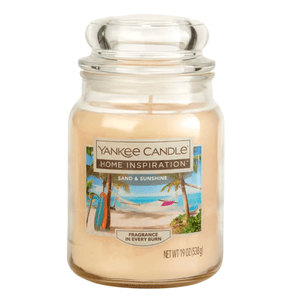 Yankee Candle Home Inspiration \“Sand & Sunshine\“ scented jar candle, net weight 19 oz (538 g), featuring a tropical beach scene on the label.