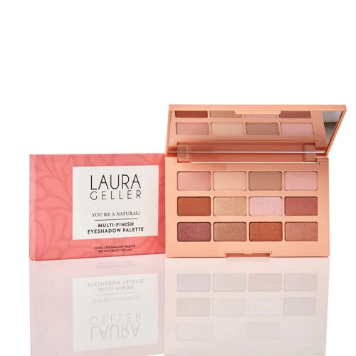 Laura Geller's \“You're a Natural\“ multi-finish eyeshadow palette features 12 neutral shades in matte and shimmer finishes, housed in a sleek, pink case with a mirror.