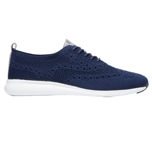 A navy blue knit sneaker with a perforated design, featuring a white sole for contrast. Ideal for casual wear.