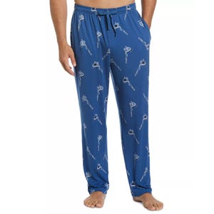 Blue pajama pants with a drawstring waist, featuring a pattern of keys.
