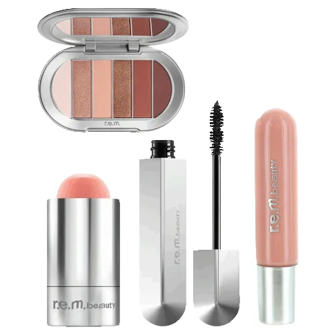 A collection of r.e.m. beauty products including an eyeshadow palette, blush stick, mascara, and lip gloss.
