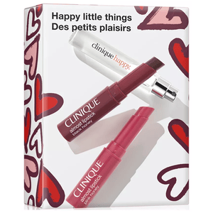 Clinique Black Honey Set includes a Clinique Happy fragrance spray and two Almost Lipsticks in Black Honey and Pink Honey. The packaging is decorated with heart designs.