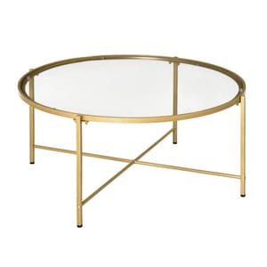 Round coffee table with a clear glass top and gold-finished metal frame, featuring a minimalist design with cross-brace support.