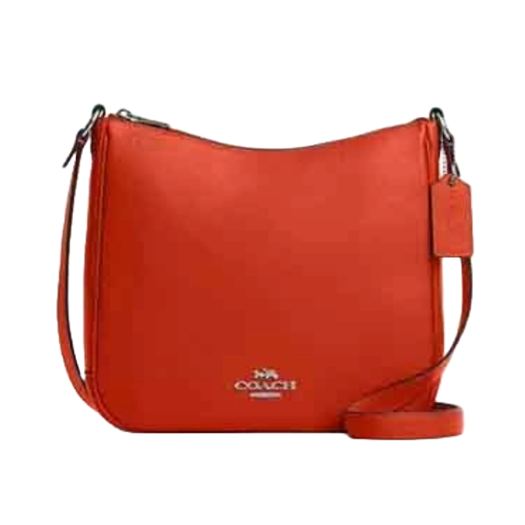 Orange Coach Ellie File Bag with a minimalist design, crossbody strap, and metal logo detailing. It features a leather tag and a sleek shape, ideal for everyday use.