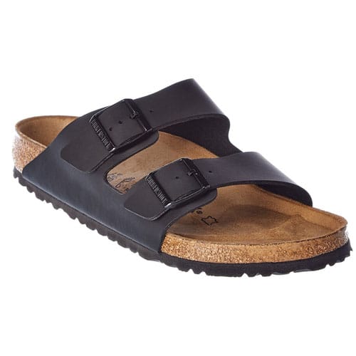 A black two-strap sandal with adjustable buckles, featuring a contoured cork footbed and a textured rubber sole.