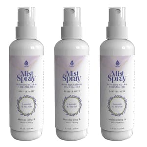 Three bottles of mist spray labeled \“Restful Sleep\“ with lavender and sea salt, featuring 100% natural essential oils. Each bottle is 8.5 oz (250 ml).