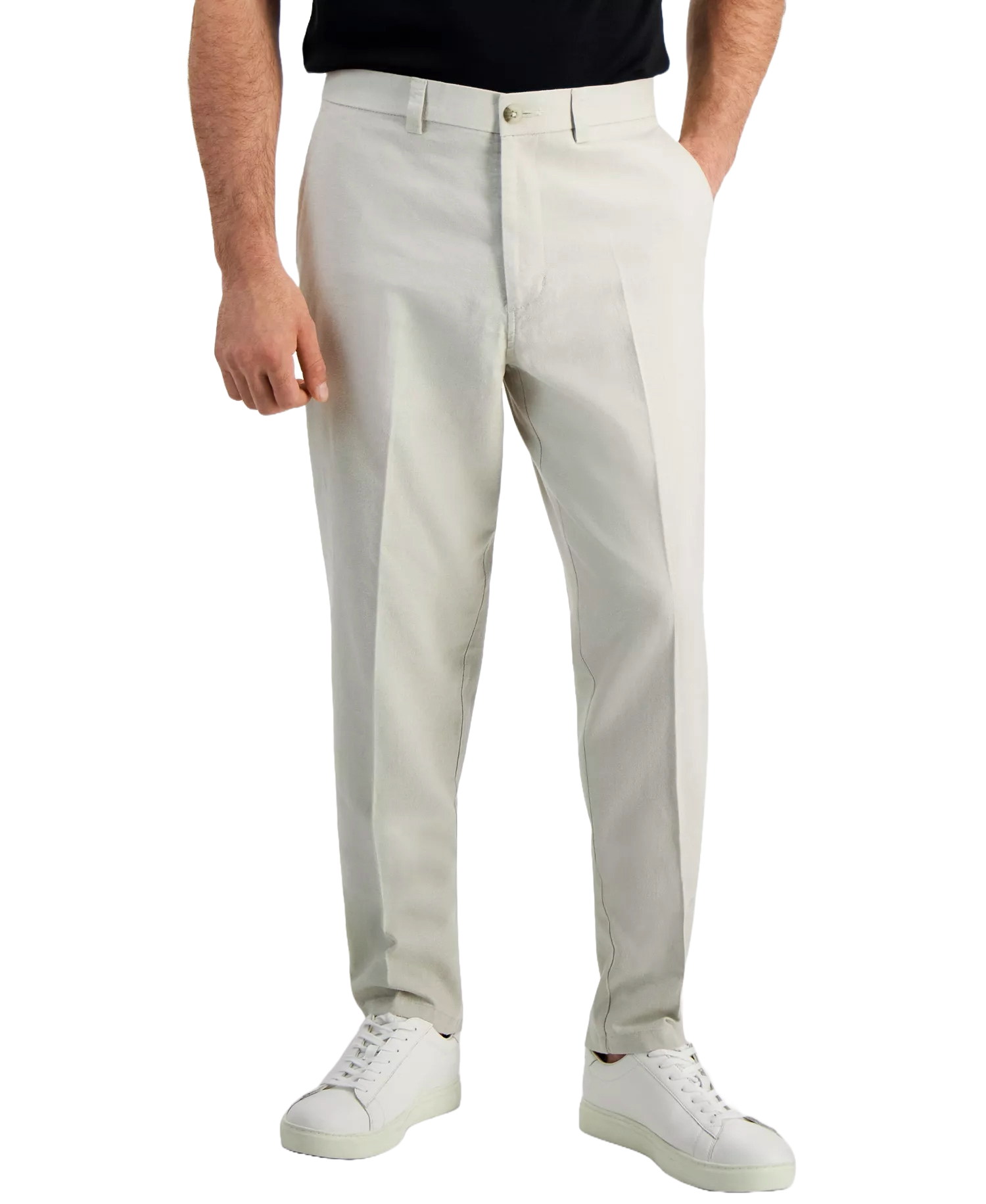 A pair of light beige tailored trousers with a button closure, paired with white sneakers. The outfit features a simple, classic style suitable for casual wear.