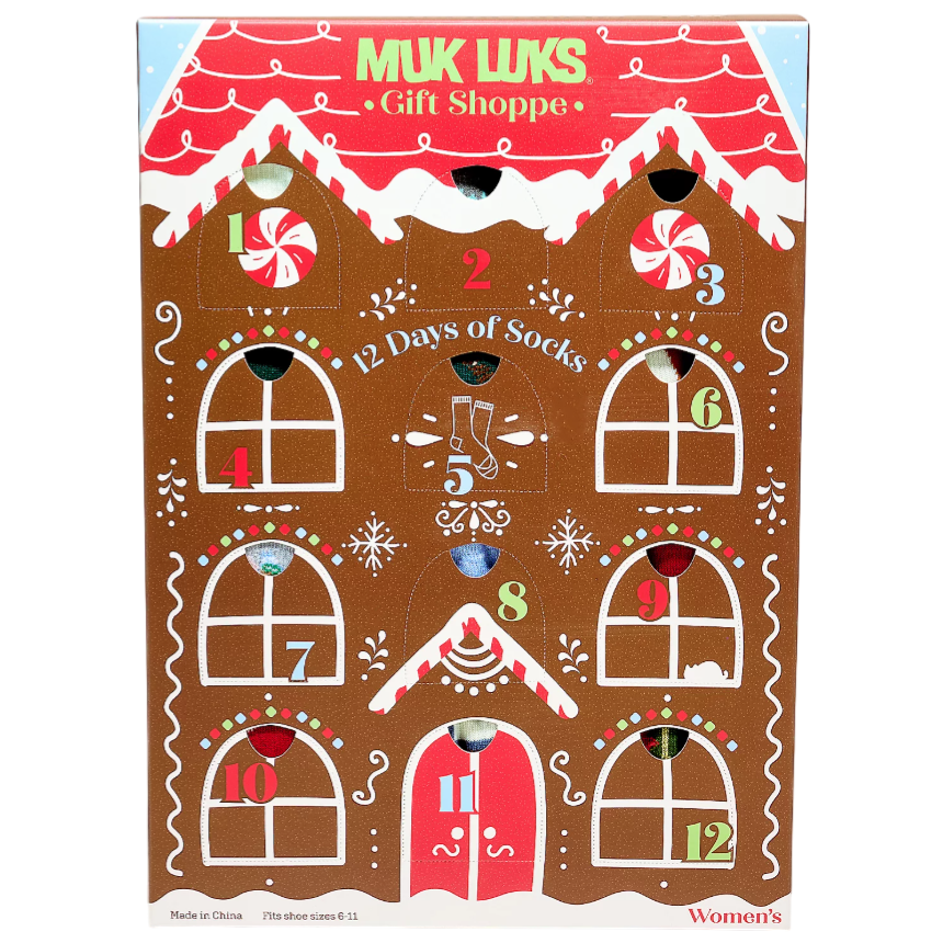 Muk Luks Gift Shoppe features a \“12 Days of Socks\“ advent calendar with numbered doors, designed like a gingerbread house. Suitable for women's shoe sizes 6-11.