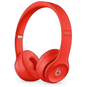 Red wireless over-ear headphones with a prominent \“b\“ logo on the ear cups, featuring cushioned ear pads and a flexible headband.