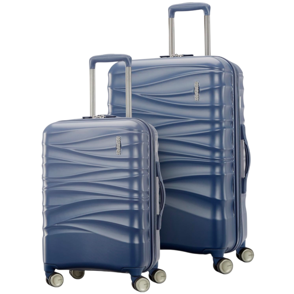 Two blue hard-shell suitcases with telescopic handles and four wheels, featuring a wavy design pattern.