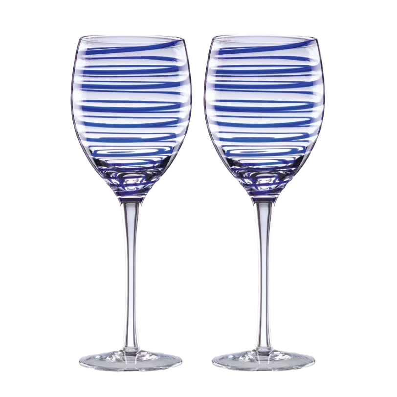 A pair of Kate Spade Charlotte St wine glasses featuring clear glass with horizontal blue stripes, elegantly designed with a long stem.