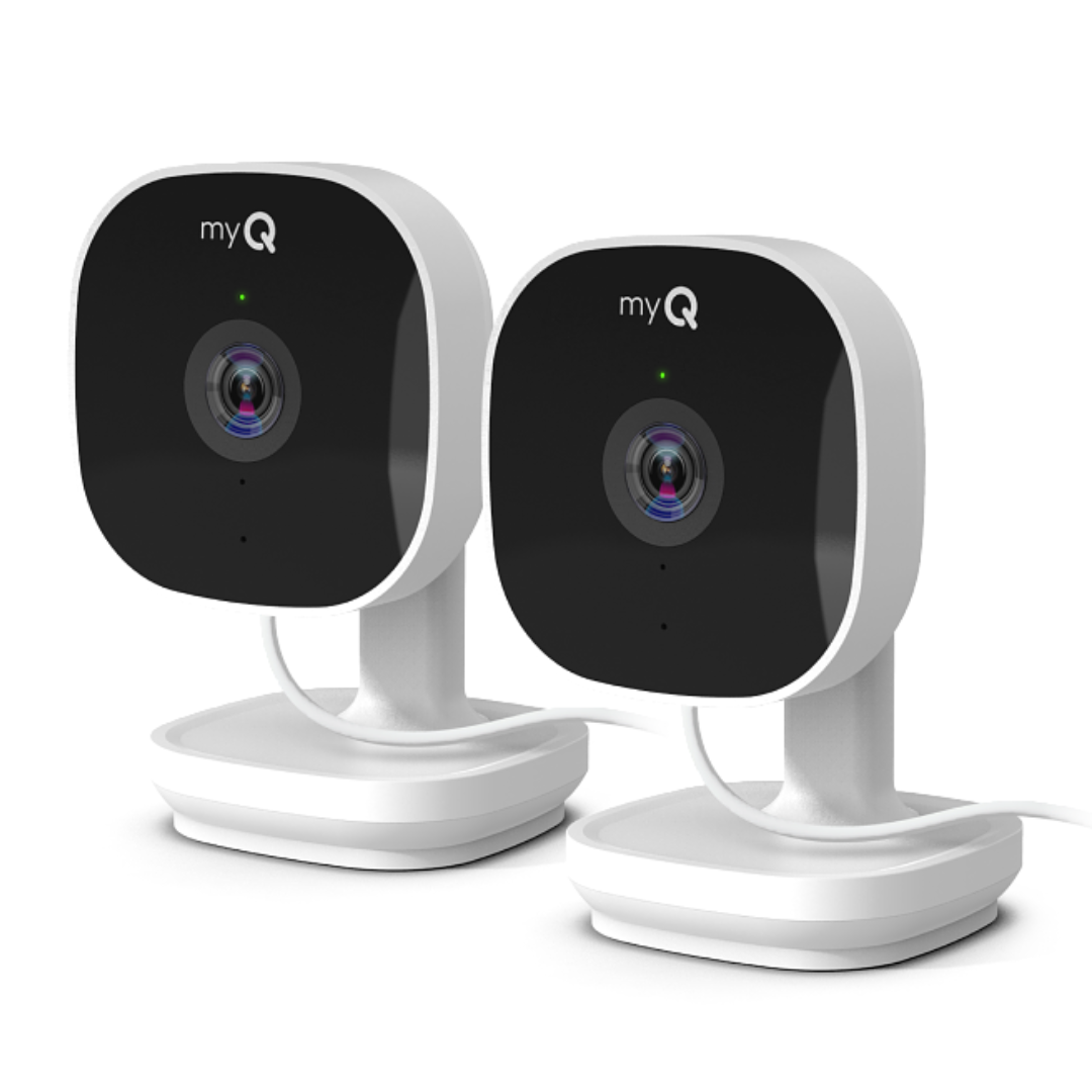 Two myQ indoor security cameras with a sleek black front and white base, featuring visible lenses and wired connections.