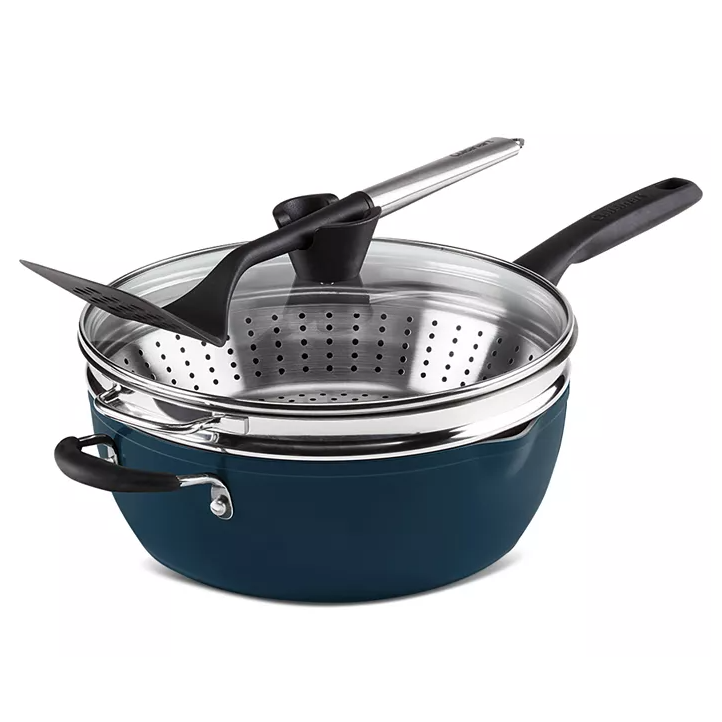 Deep saucepan set with a strainer insert, glass lid, and a black spatula, designed for versatile cooking.