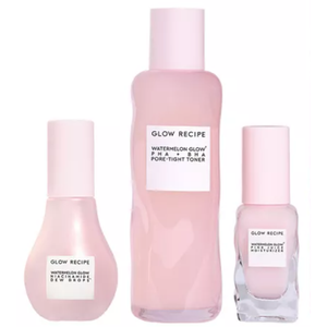 Glow Recipe Watermelon Glow Icons set includes Watermelon Glow PHA + BHA Pore-Tight Toner, Watermelon Glow Niacinamide Dew Drops, and Watermelon Glow Pink Juice Moisturizer, packaged in pastel pink bottles.