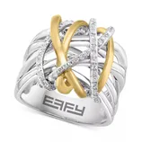 A silver and gold crisscross ring with diamond embellishments, featuring the EFFY logo engraved inside.
