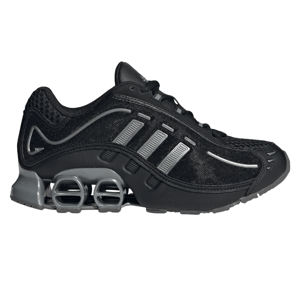 A black athletic shoe with grey accents, featuring a mesh upper and unique spring-like cushioning in the sole.