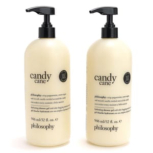 Two bottles of Philosophy Candy Cane hydrating shower gel, each 946 ml (32 fl. oz.), featuring a crisp peppermint, sweet sugar, and smooth vanilla scent.