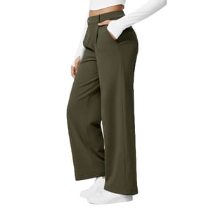 Olive green wide-leg pants paired with a white long-sleeve top and white sneakers.