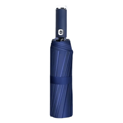 A compact blue umbrella with a sleek design and a button on the handle for automatic opening and closing.