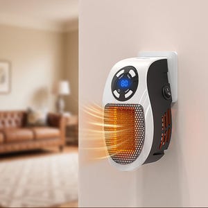A compact wall-mounted electric space heater with LED display and control buttons is plugged into an outlet, emitting warm air.
